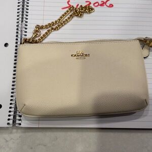 Coach crème wristlet